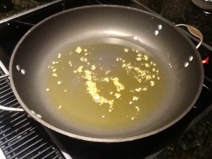 Saute garlic in EVOO
